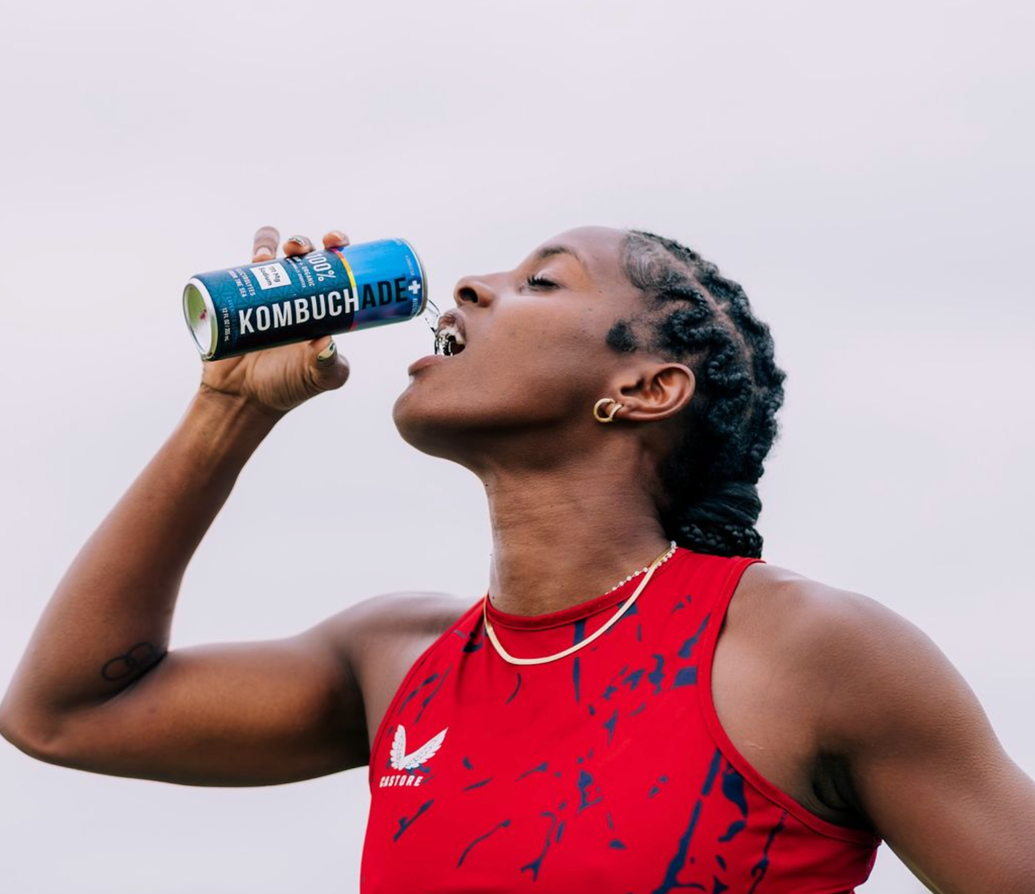 Athlete drinking Kombuchade